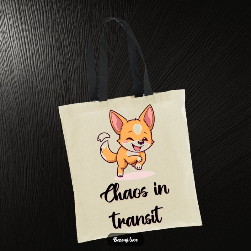 Funny tote bag featuring a Basenji with a playful grin chasing its tail in a circle.